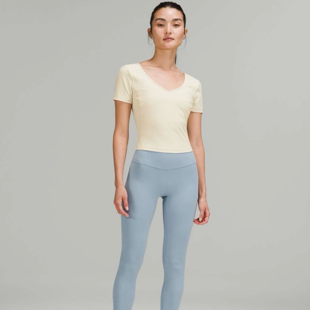Cream Top and Blue Leggings